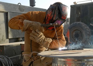 construction welder welding at job site